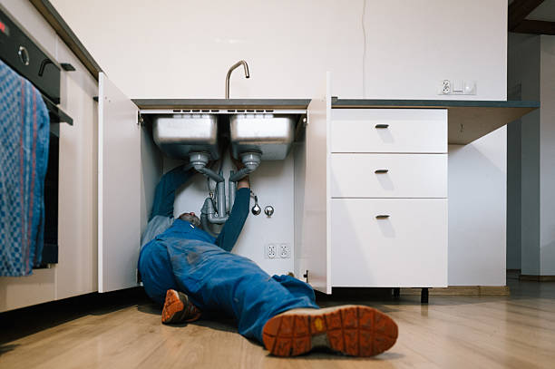 Professional Drain Cleaning technician working in Petersburg, VA